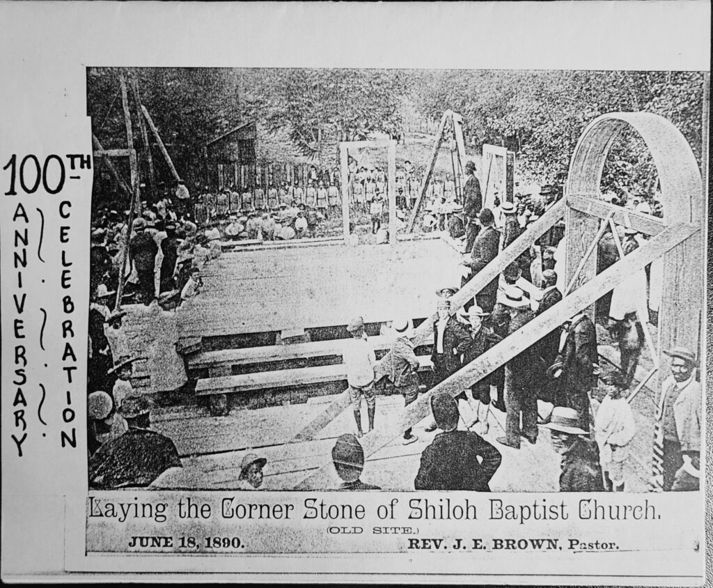 Souvenir flyer for the 100th anniversary of Shiloh (old site) Baptist Church, featuring a photo of a crowd gathered for the laying of the corner stone